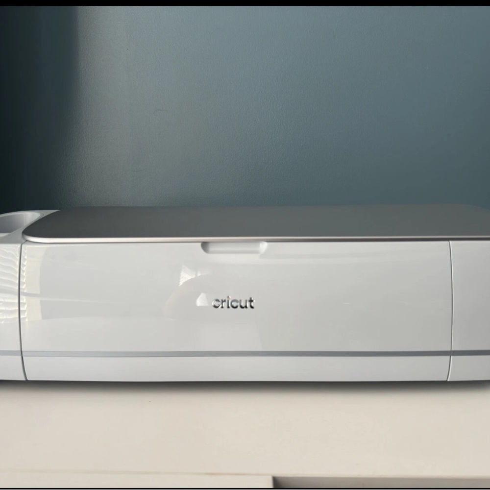 Cricut Cutting Machine in blue light